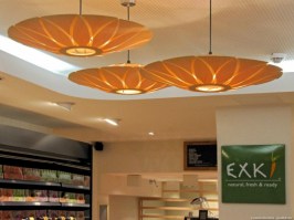 Exki - Paris 3 lotus lamps in wood at entrance